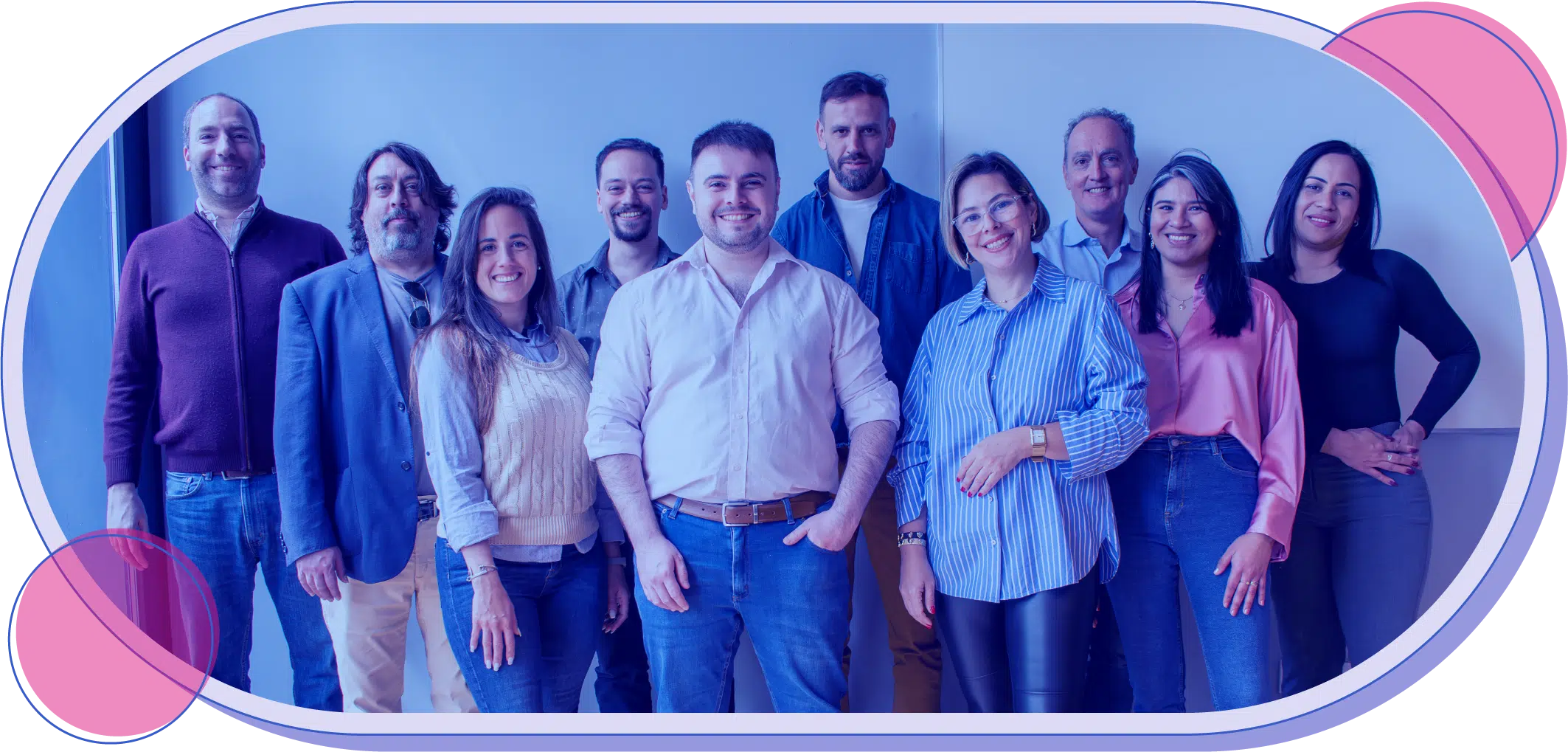 The Coorva team standing together and smiling